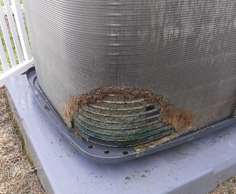 Corrosion on bottom of ac compressor