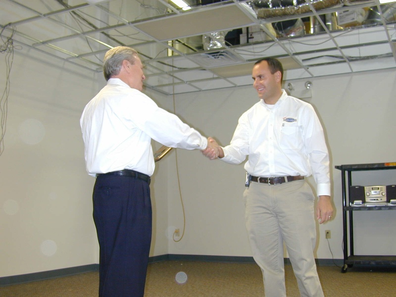allen shaking hands eagle award