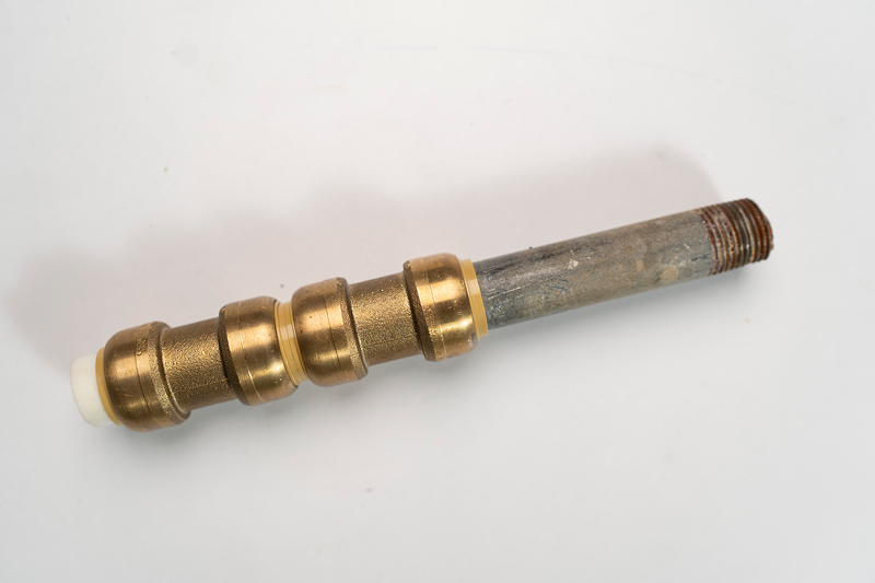 A worn galvanized steel pipe