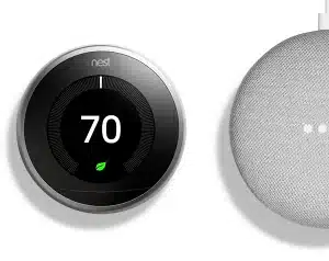 Two nest thermostats next to each other.