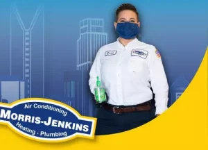 Masked-up morris-jenkins employee and some hand sanitizer