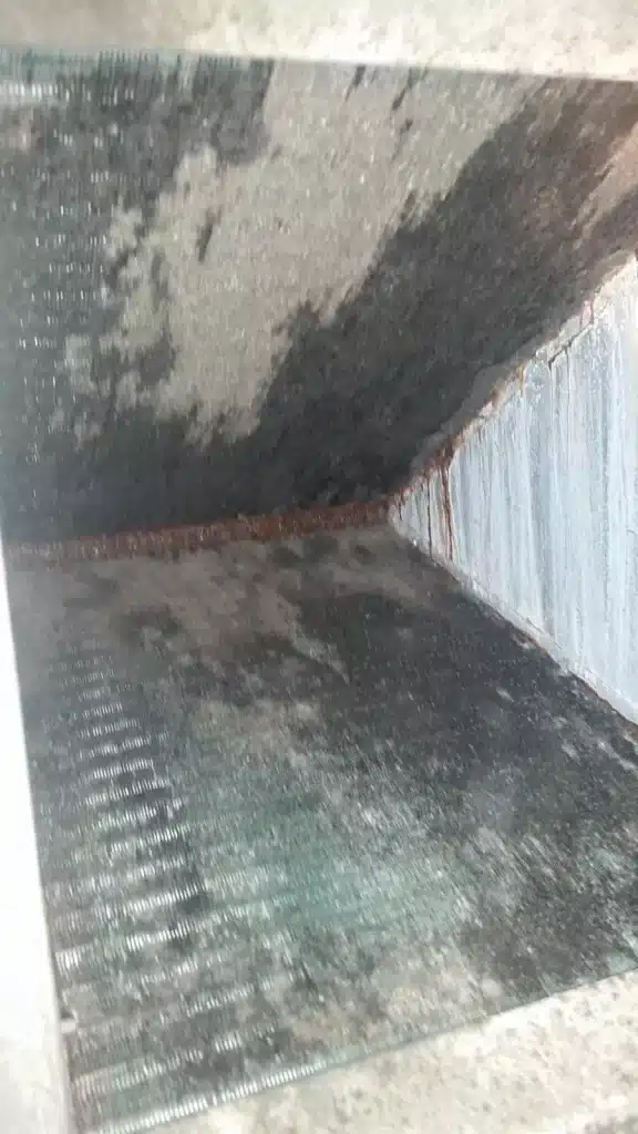 A duct with a lot of water in it.