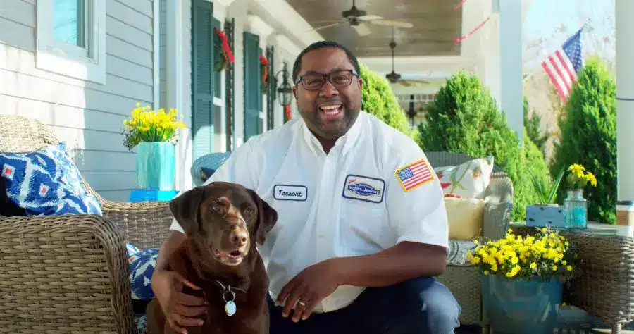 Morris-Jenkins technician with a dog.