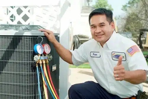 Air Conditioning Repair Tech Outside