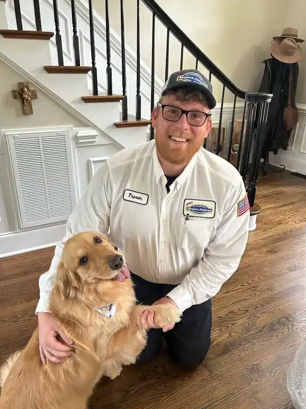 Morris-Jenkins Service Technician with a Dog